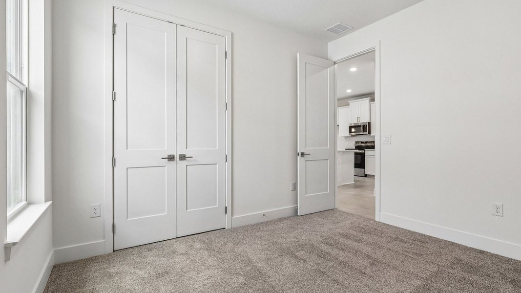 Furnished interior view inside a new home in Trailside, Mount Dora (Image 23).