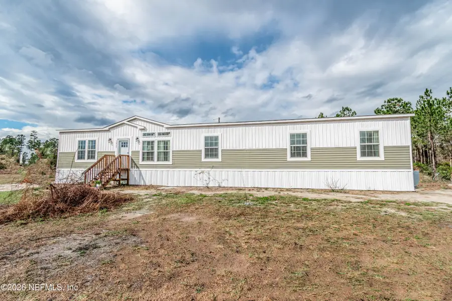 Exterior details and patio area of a home in , Glen St. Mary (Image 2). Exterior details and patio area of a home in , Glen St. Mary (Image 2).