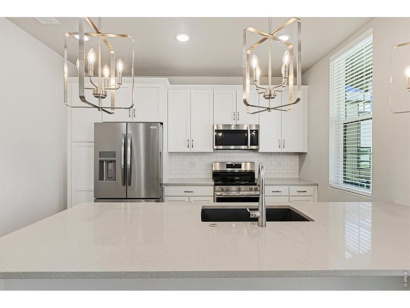 Furnished interior view inside a new home in Northfield at Old Town - Vista Collection, Fort Collins (Image 6).