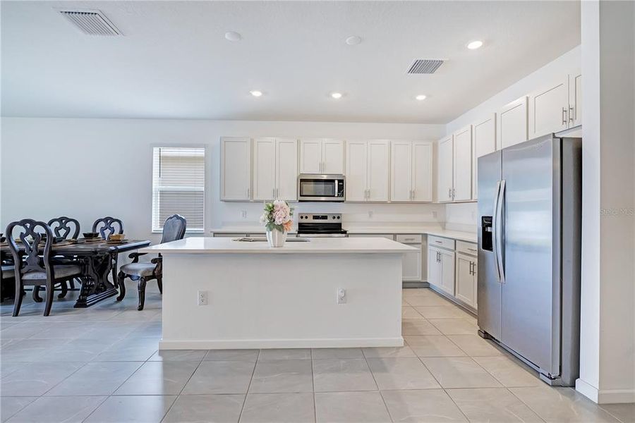 Furnished interior view inside a new home in Cypress Park Estates, Haines City (Image 13).