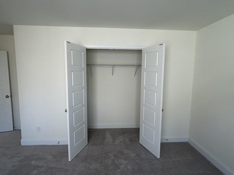 Spacious, unfurnished interior of a new home in Miller's Reserve, Winston-Salem (Image 48).