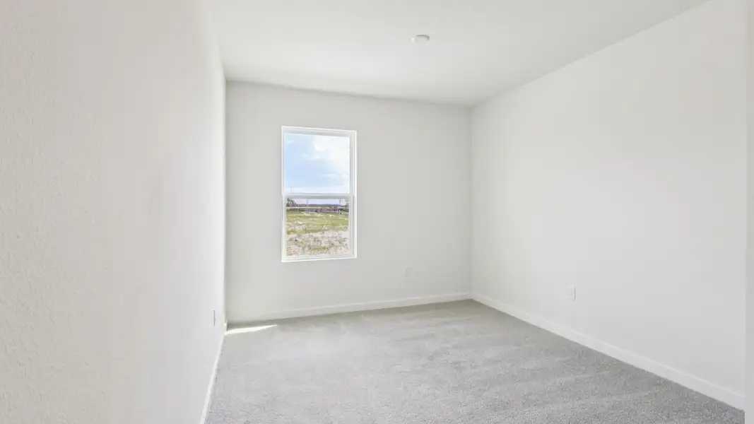 Representative unfurnished interior of a home built from the Baker by DRB Homes in Liberty Trace, Haines City (Image 31).