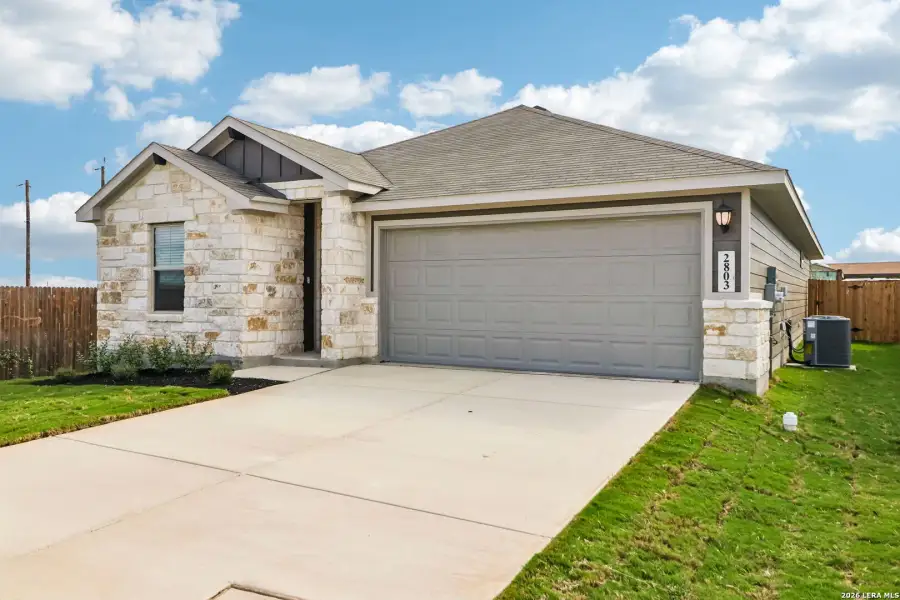 Front exterior of a new home in Catalina, Converse, TX, highlighting curb appeal (Image 22). Front exterior of a new home in Catalina, Converse, TX, highlighting curb appeal (Image 22).