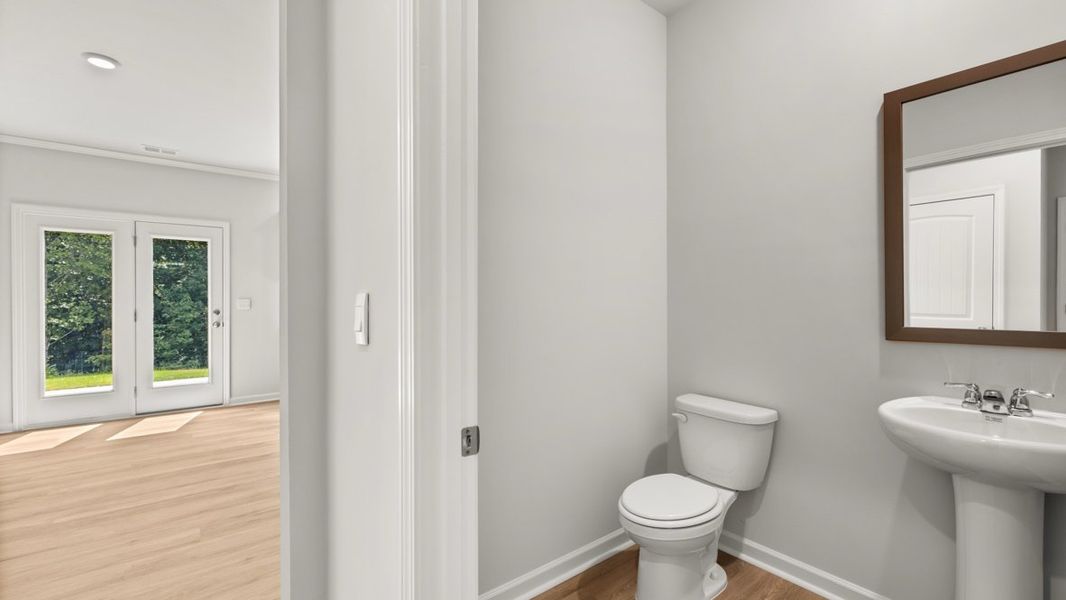 Furnished interior view inside a new home in Northwoods at Mirror Lake, Villa Rica (Image 7).