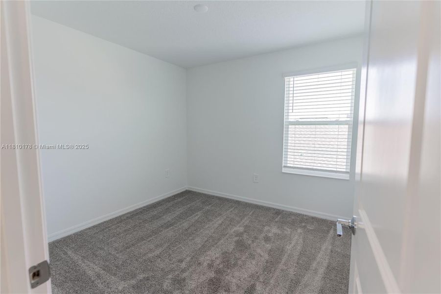 Spacious, unfurnished interior of a new home in Inman Groves, Winter Haven (Image 40). Spacious, unfurnished interior of a new home in Inman Groves, Winter Haven (Image 40).