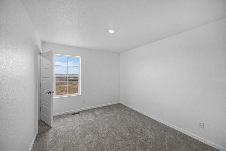 Spacious, unfurnished interior of a new home in The Aurora Highlands, Aurora (Image 9).