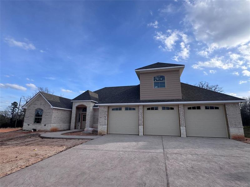 Front exterior of a new home in , Lindale, TX, highlighting curb appeal (Image 1). Front exterior of a new home in , Lindale, TX, highlighting curb appeal (Image 1).