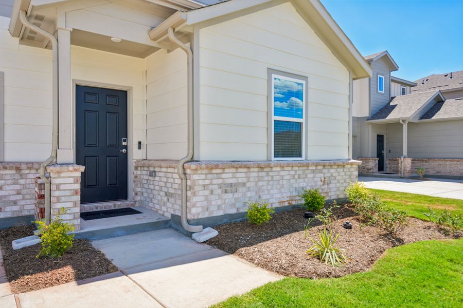 Exterior details and patio area of a home in River Ridge, Crandall (Image 21). Exterior details and patio area of a home in River Ridge, Crandall (Image 21).
