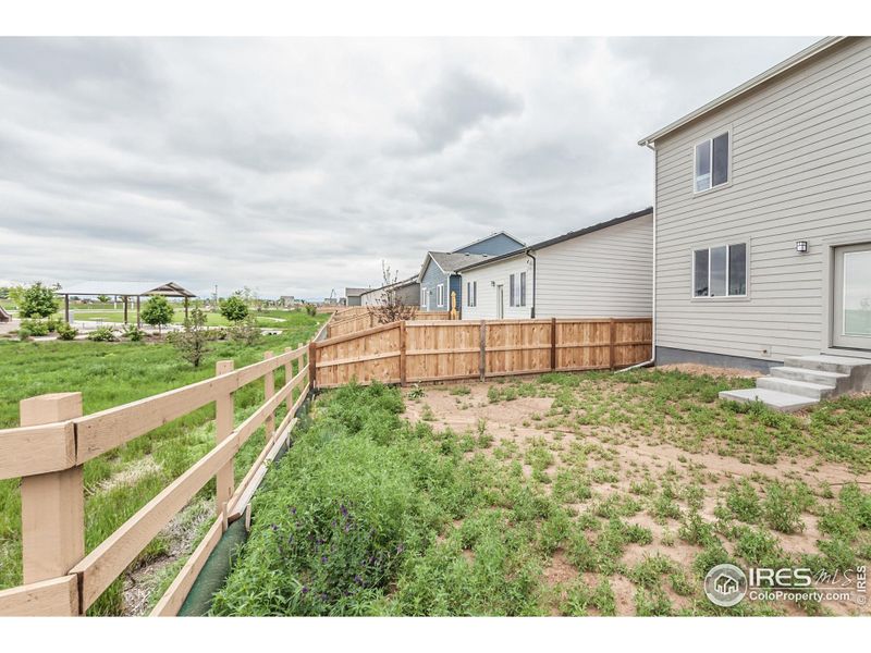 BACKYARD W/ PARTIAL FENCING