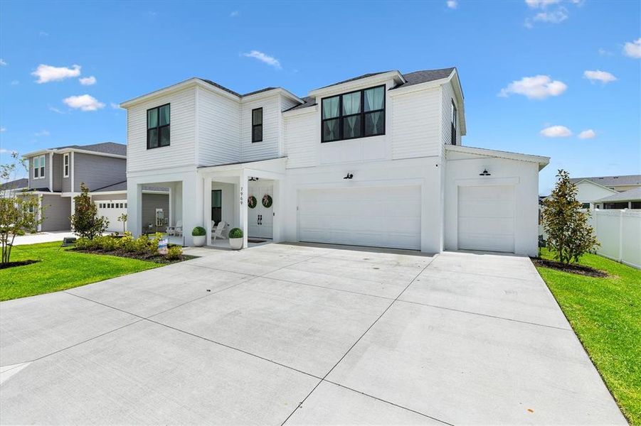 Front exterior of a new home in , Okahumpka, FL, highlighting curb appeal (Image 2).