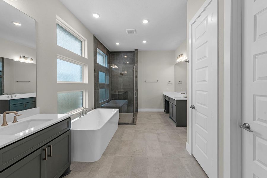 Furnished interior view inside a new home in Bridgeland, Cypress (Image 27).