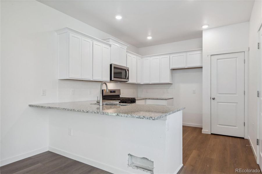 Furnished interior view inside a new home in Horizon Uptown, Aurora (Image 5).