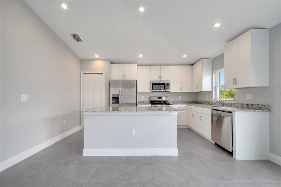 Furnished interior view inside a new home in , Kissimmee (Image 10).