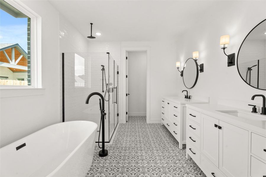 Luxurious primary bath (*Photo not of actual home and used for illustration purposes only.)