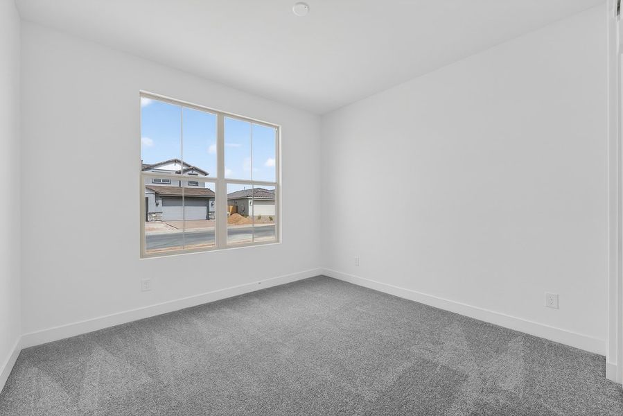 Spacious, unfurnished interior of a new home in Ladera Trails, Queen Creek (Image 16).