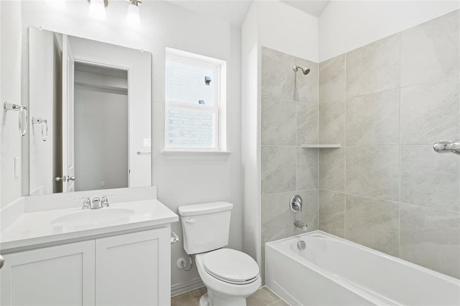 Full bath with shower / tub combination and vanity