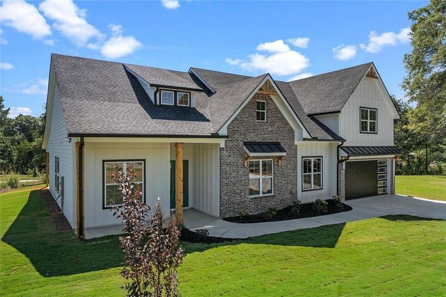 Front exterior of a new home in , Powder Springs, GA, highlighting curb appeal (Image 29).