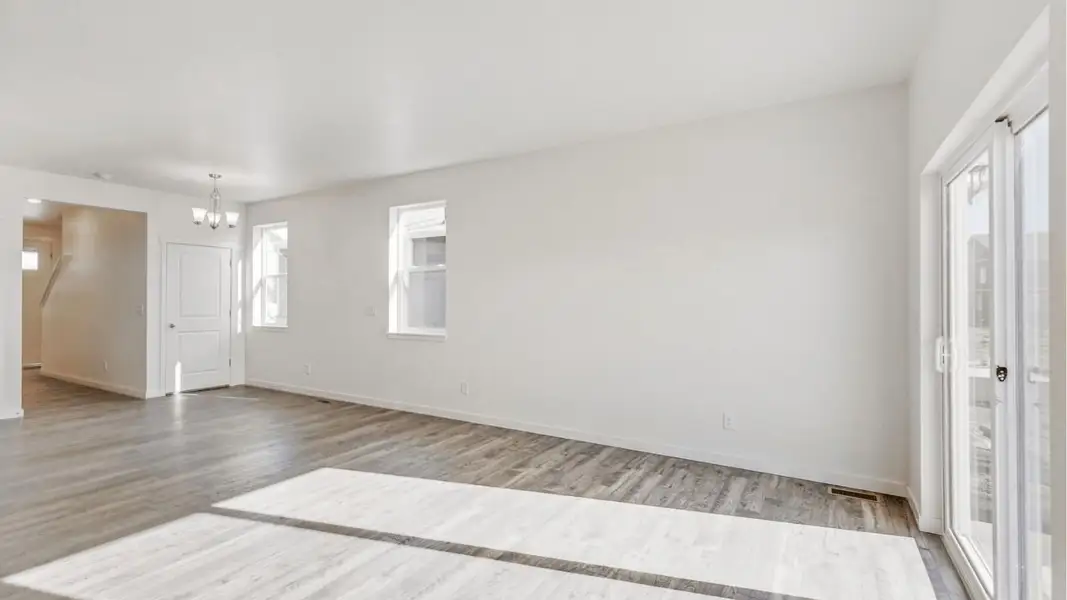 Representative unfurnished interior of a home built from the Elm by D.R. Horton in Granary, Johnstown (Image 9).