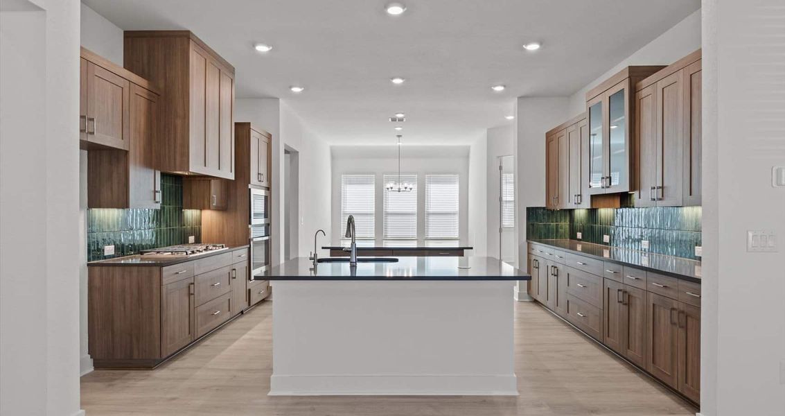 Representative furnished interior of a home built from the Samantha by Chesmar Homes in Sunfield, Buda (Image 3).