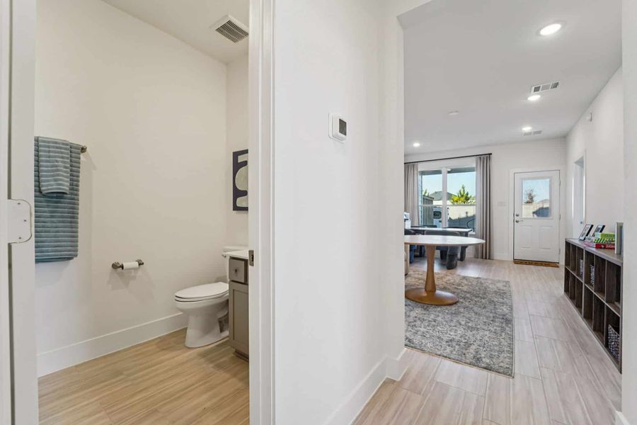 Furnished interior view inside a new home in Bridgeland, Cypress (Image 25).