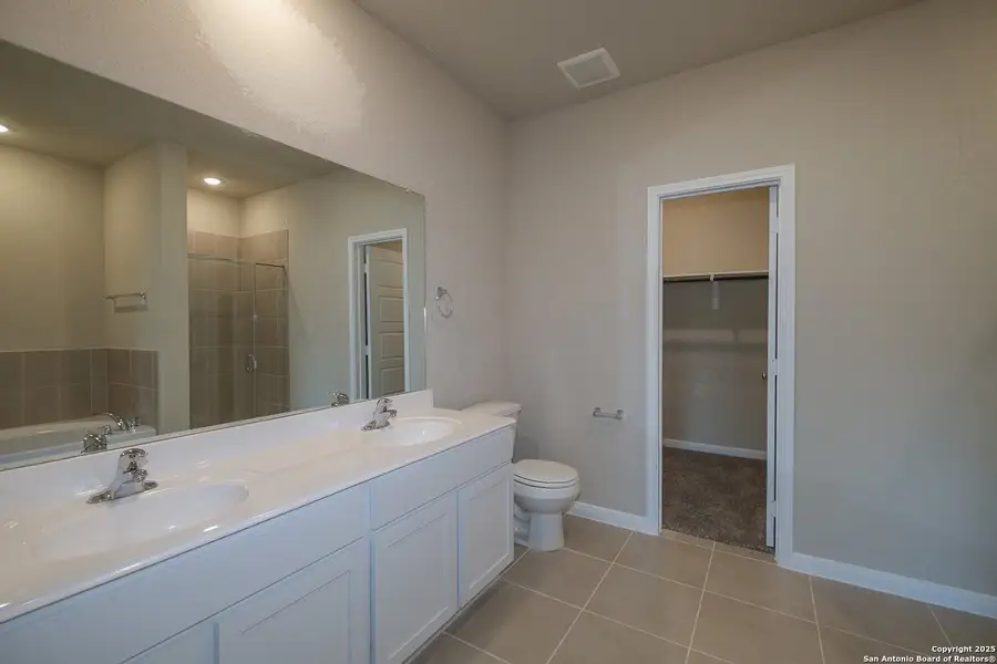 Furnished interior view inside a new home in Hunters Ranch, San Antonio (Image 7).