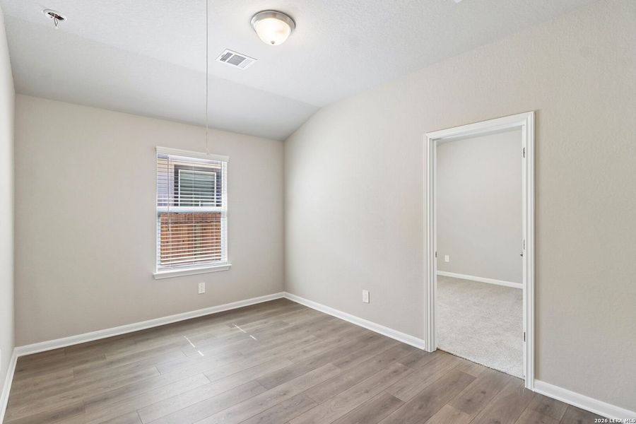 Spacious, unfurnished interior of a new home in Estancia Ranch - Premier Series, San Antonio (Image 35).