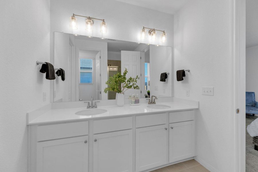 Furnished interior view inside a new home in Seasons at Carillon, Manor (Image 19).