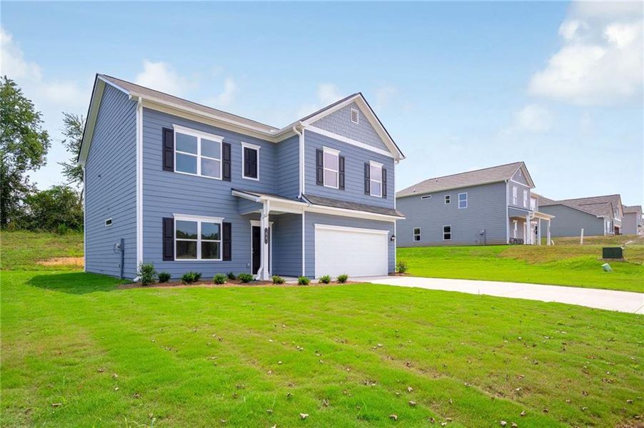 Front exterior of a new home in Laurel Ridge, Rock Spring, GA, highlighting curb appeal (Image 2). Front exterior of a new home in Laurel Ridge, Rock Spring, GA, highlighting curb appeal (Image 2).