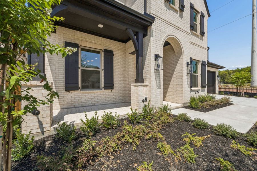 Exterior details and patio area of a home in The Parks at Wilson Creek, Celina (Image 3). Exterior details and patio area of a home in The Parks at Wilson Creek, Celina (Image 3).