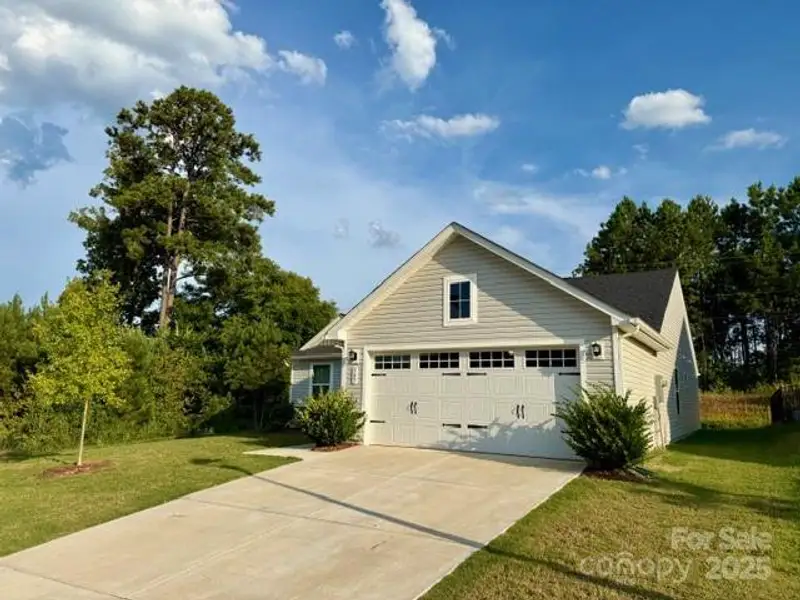 Front exterior of a new home in Rosegate, Lancaster, SC, highlighting curb appeal (Image 14).
