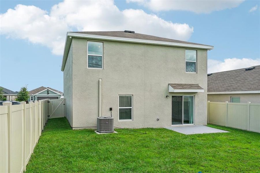 Exterior details and patio area of a home in Ridgewood, Riverview (Image 26).