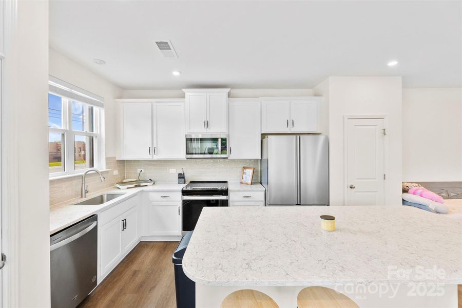 Furnished interior view inside a new home in , Belmont (Image 4).