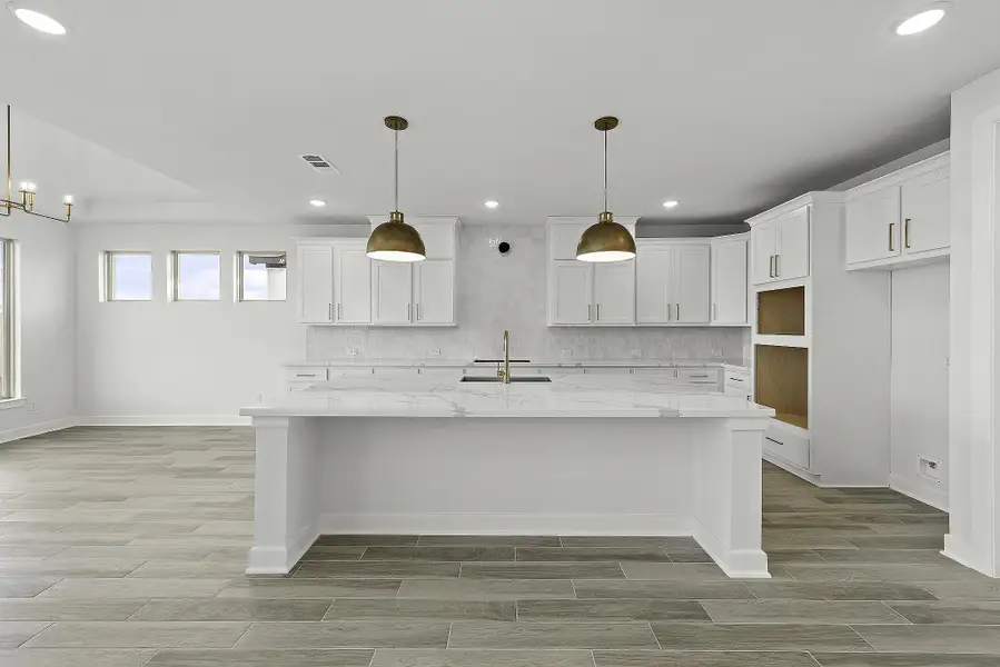 Furnished interior view inside a new home in Bridgeland, Cypress (Image 3).