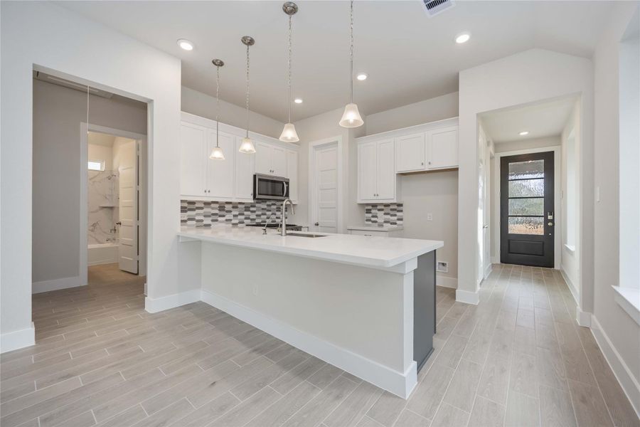 Furnished interior view inside a new home in Sunterra, Katy (Image 7). Furnished interior view inside a new home in Sunterra, Katy (Image 7).