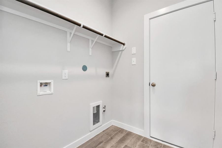 1st floor laundry room with both electric and gas dryer connections.