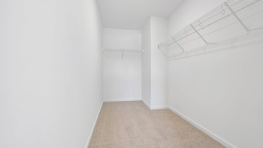 Spacious, unfurnished interior of a new home in The Townes at Belle Grove, Wendell (Image 12).