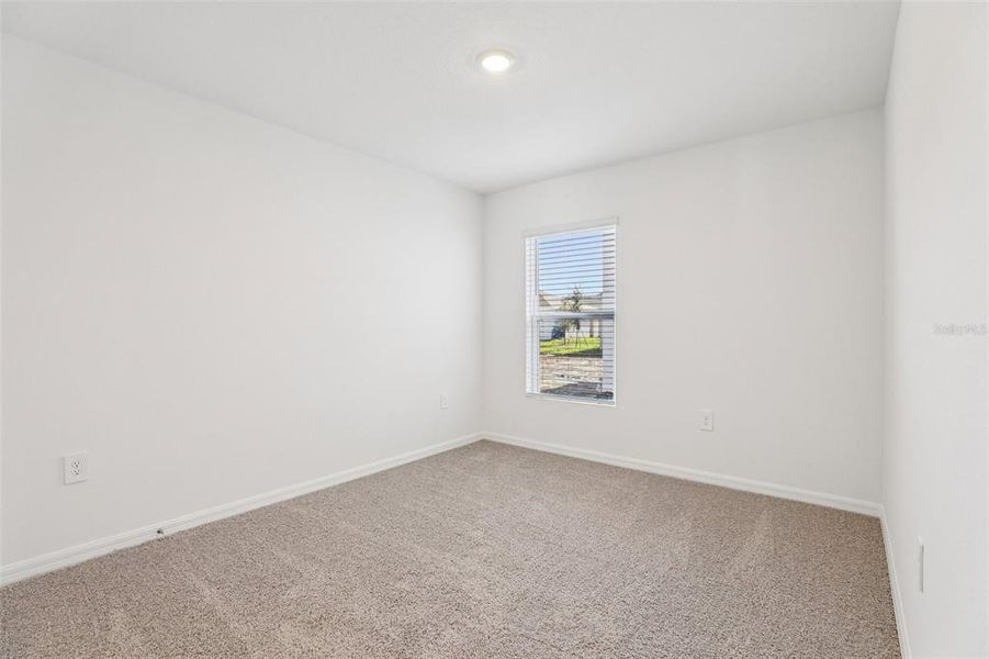 Spacious, unfurnished interior of a new home in Villamar, Winter Haven (Image 24).