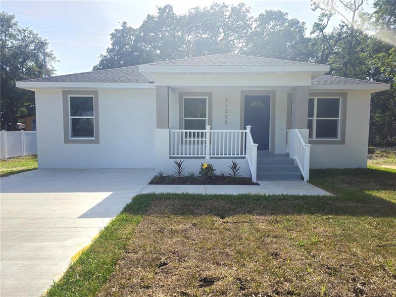 Front exterior of a new home in , Dade City, FL, highlighting curb appeal (Image 18).