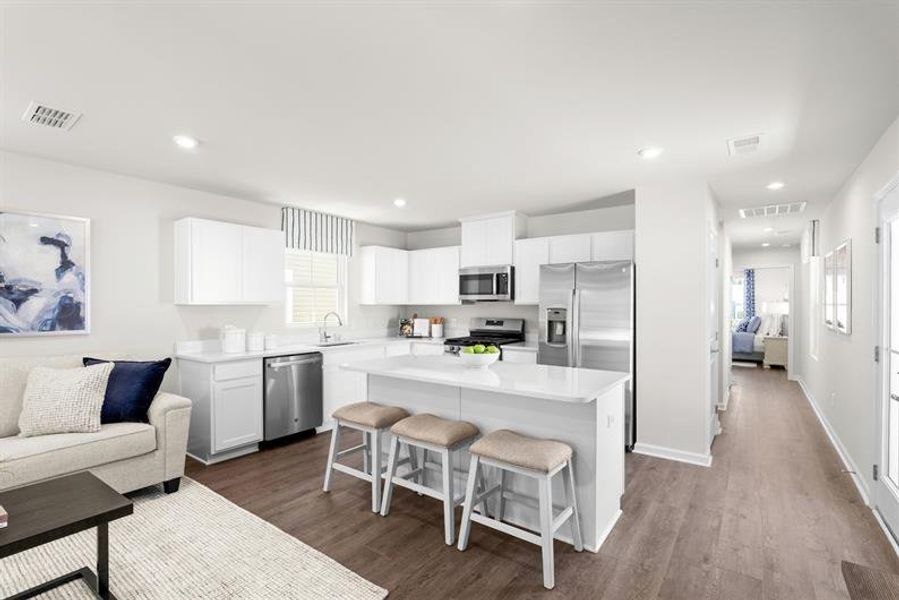 Representative furnished interior of a home built from the Ellis by Ryan Homes in Middle Creek Village Coastal Cottages & Villas, Bolivia (Image 3).