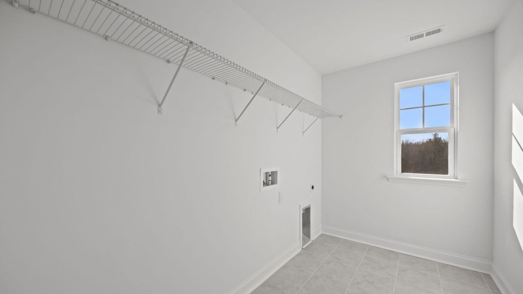 The Burton Plan by DRB homes at Lakeside Glen, in York SC - Laundry Room
