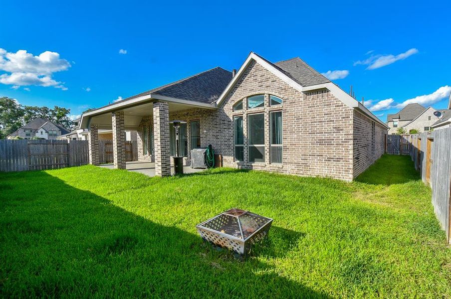 Spacious Backyard Oasis with Expansive Covered Patio