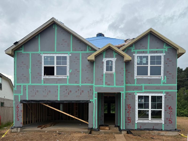 The front exterior of this new construction home showcases a clean, contemporary look with timeless architectural appeal. The front exterior of this new construction home showcases a clean, contemporary look with timeless architectural appeal.