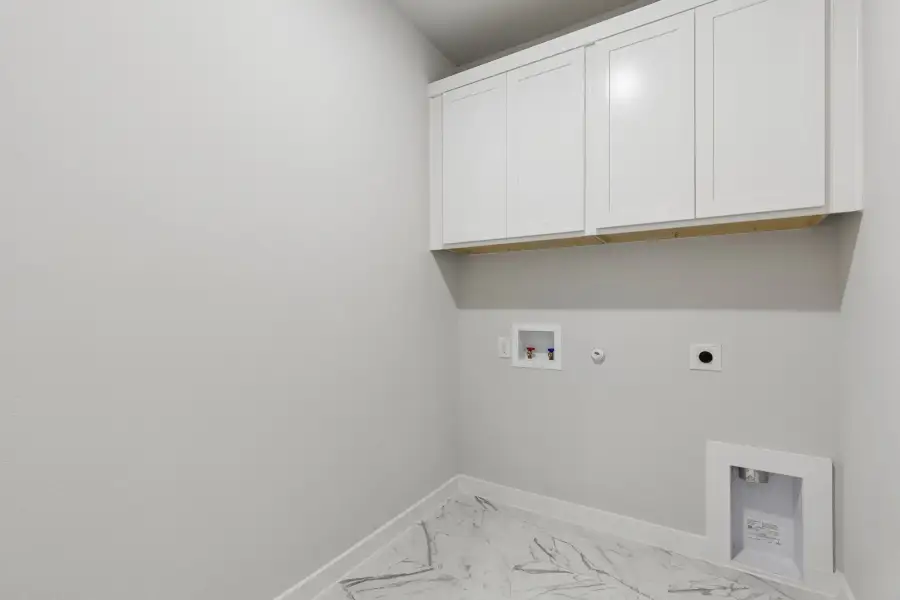 Utility Room in the Winters home plan by Trophy Signature Homes – REPRESENTATIVE PHOTO