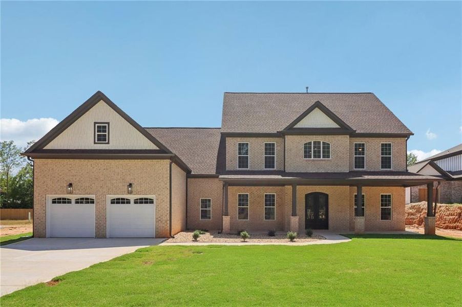 Front exterior of a new home in , Lilburn, GA, highlighting curb appeal (Image 28).