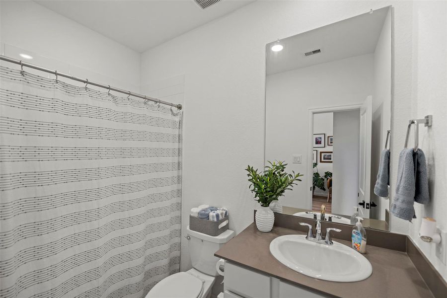 Furnished interior view inside a new home in The Trails, New Caney (Image 27). Furnished interior view inside a new home in The Trails, New Caney (Image 27).