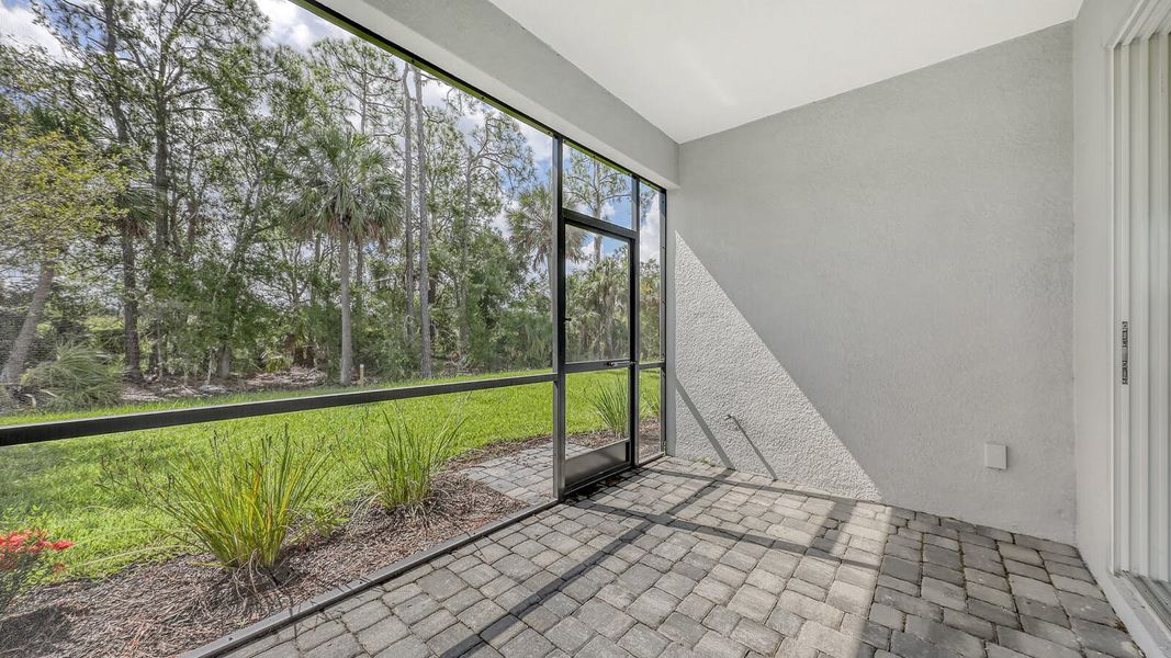 Exterior details and patio area of a home in Wildleaf Real Estate and Homes for Sale in Parrish, FL - Neal Communities, Parrish (Image 3). Exterior details and patio area of a home in Wildleaf Real Estate and Homes for Sale in Parrish, FL - Neal Communities, Parrish (Image 3).