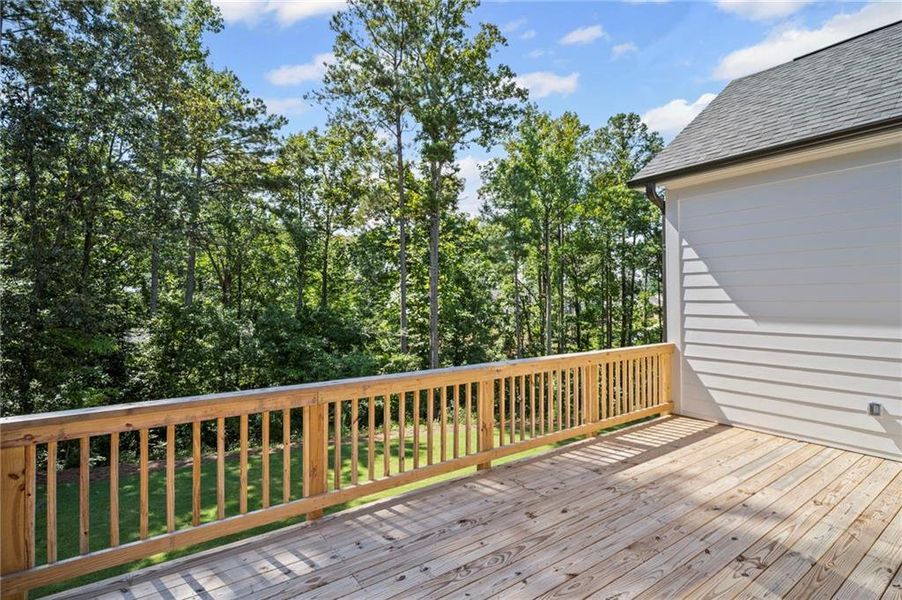 Front exterior of a new home in Lakeside at River Green, Canton, GA, highlighting curb appeal (Image 11). Front exterior of a new home in Lakeside at River Green, Canton, GA, highlighting curb appeal (Image 11).