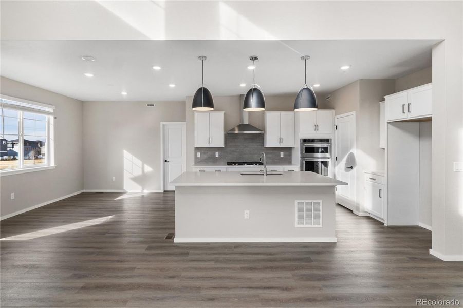 Furnished interior view inside a new home in Harvest Crossing, Aurora (Image 9).