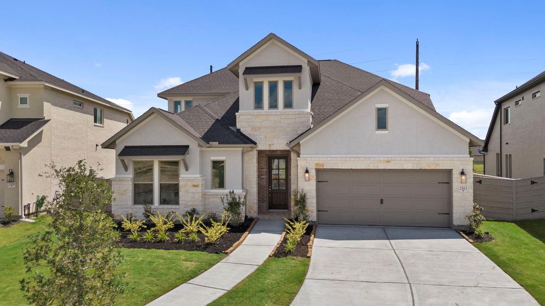 Front exterior of a new home in Pomona, Manvel, TX, highlighting curb appeal (Image 22).