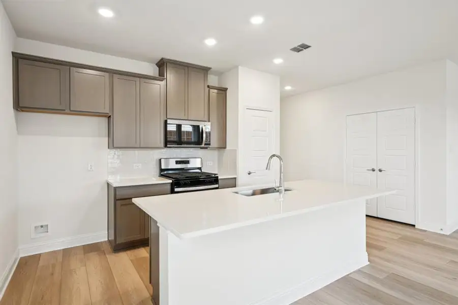 Furnished interior view inside a new home in Eagle Creek, Denton (Image 8).